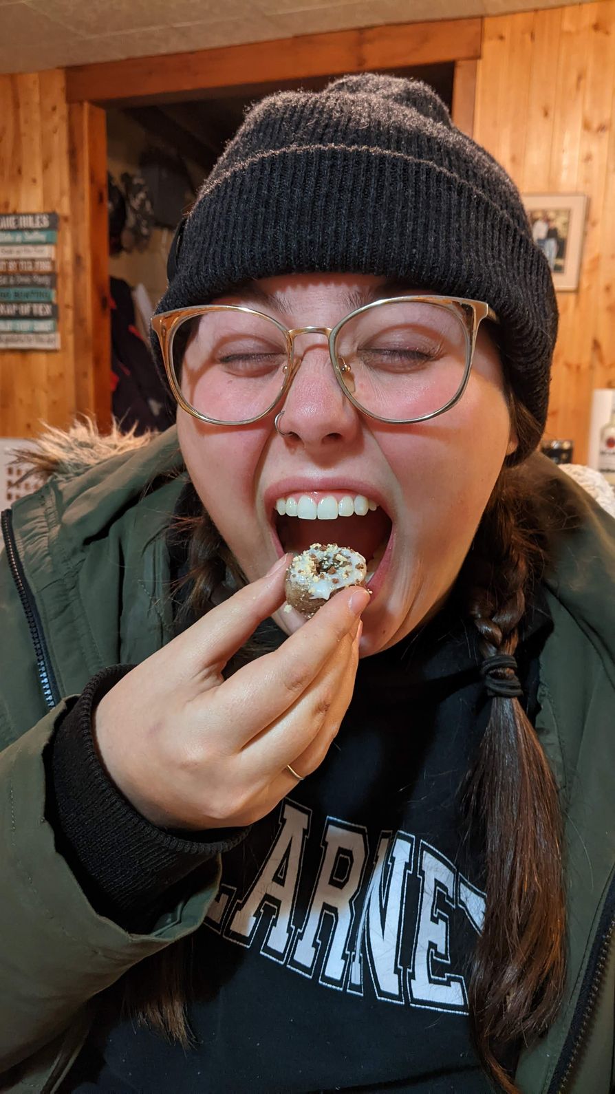 A drop-dead gorgeous woman eating a strange concoction.